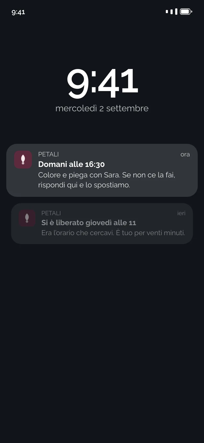 La schermata di blocco di un telefono con le notifiche del salone: il promemoria di domani e l’orario che si è liberato